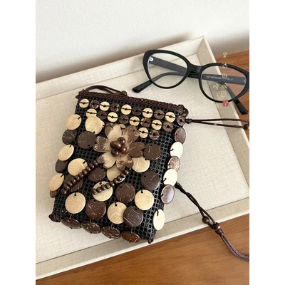 Brown flower tassel coconut shell bag