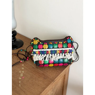 Colorful tassel coconut shell bag