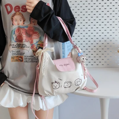 White with pink ribbon + colorful rope + cat head