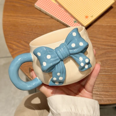 Blue polka dot bow single cup