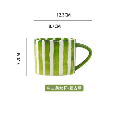 Used green striped cup