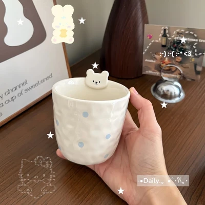 Blue flower bear rabbit-hand holding cup