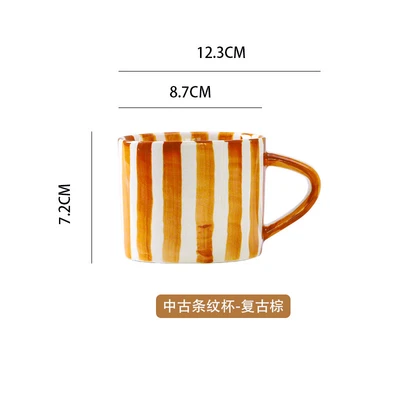 Used brown striped cup