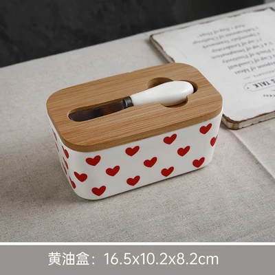 White heart-shaped butter dish