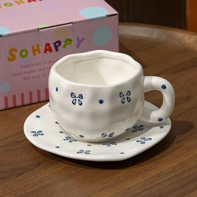 Xd-1060-010u cup and saucer (blue bow)