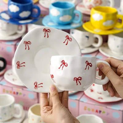 Xd-1060-007b ins style cup and saucer (double red bow)