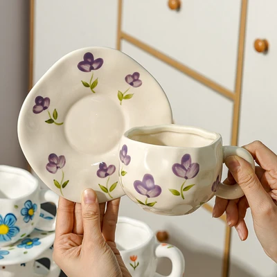 Xd-1060-010a cup and saucer (purple flower transparent yellow glaze)