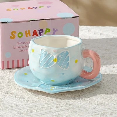 Xd-1060-010t cup and saucer (bow tie)