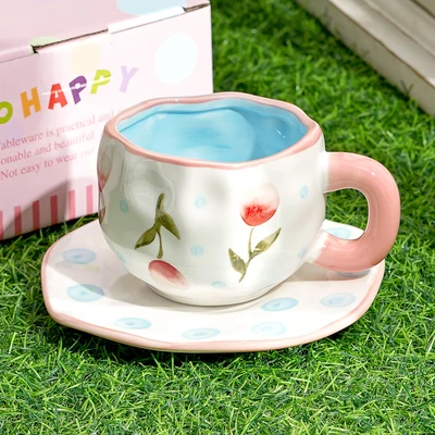 Xd-1060-010h cup and saucer (pink flower blue dot)