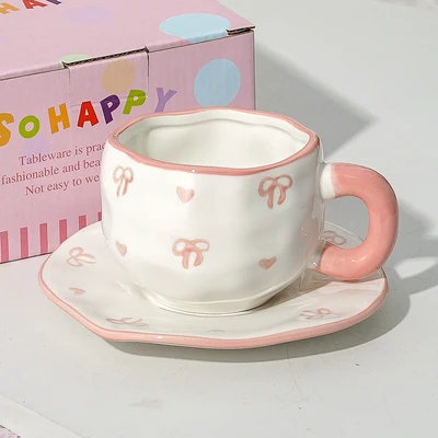 Xd-1060-010d cup and saucer (small size with love bow)
