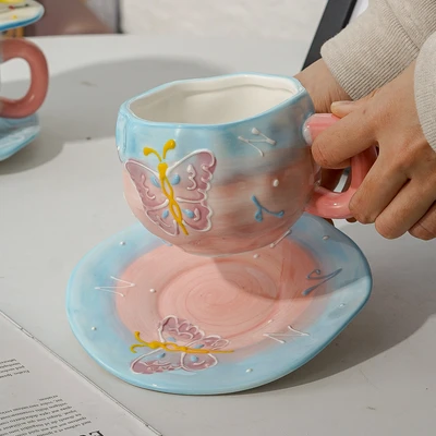 Xd-1060-010s cup and saucer (butterfly)