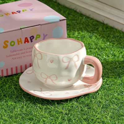Xd-1060-010e cup and saucer (large size with love bow)