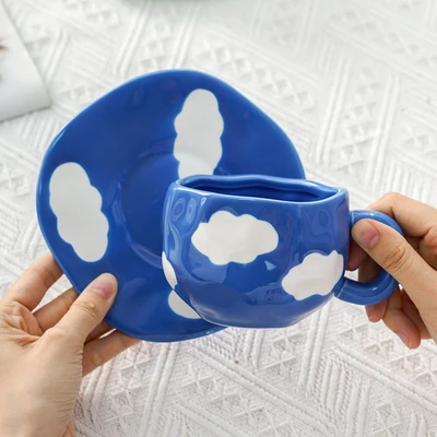 Xd-1060-006b cup and saucer (dark blue sky and white clouds)