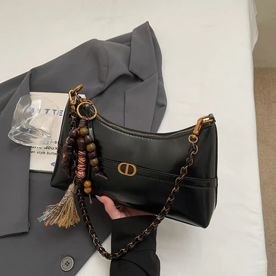 Black strap with charm