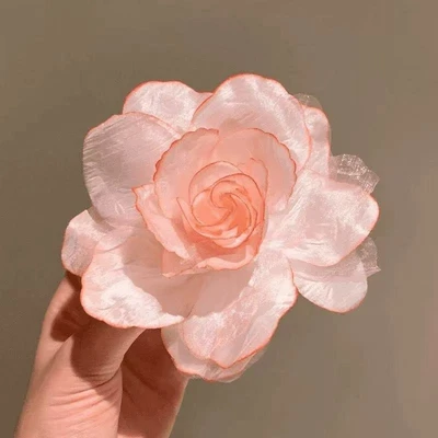 Large rose in pink mesh
