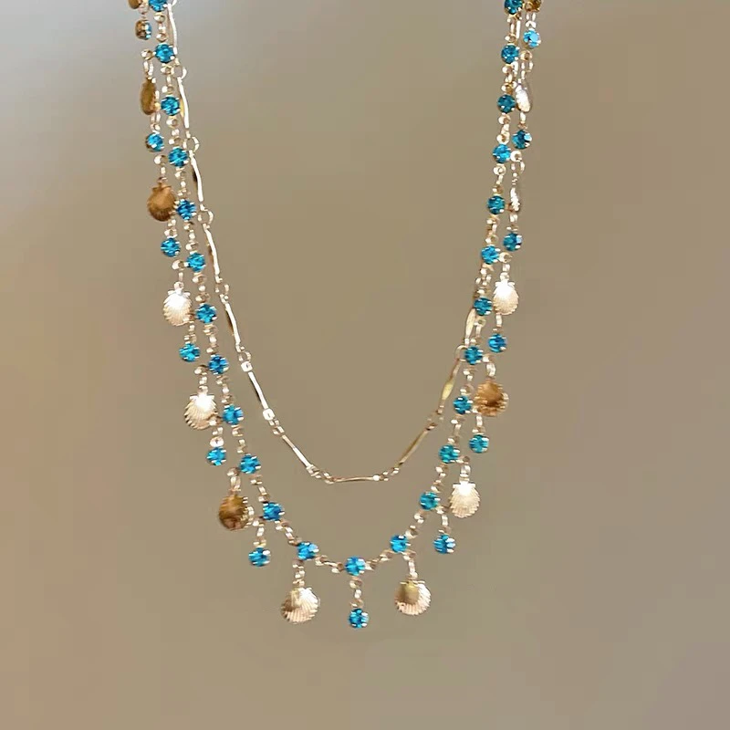 Daughter of the Sea ~ Blue Zircon Gold Shell Necklace All-match