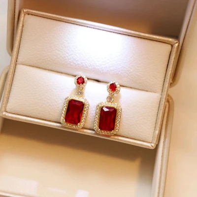 Red stud earrings