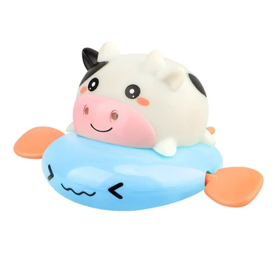 Blue cute cow playing in water