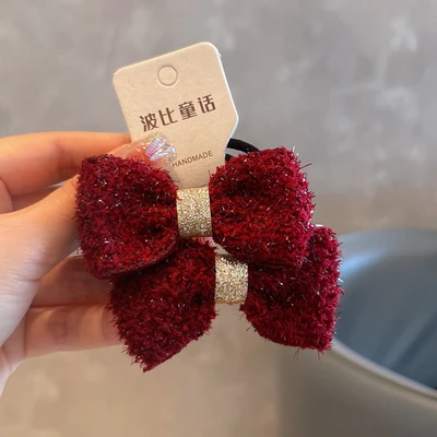 A pair of small hair ties
