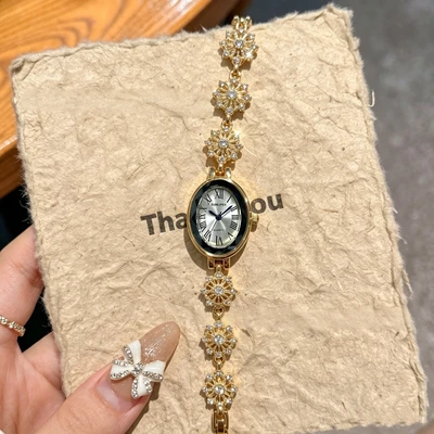 Light gold-tone white dial