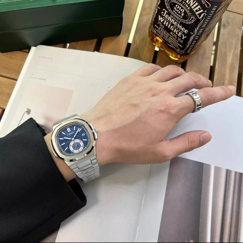 Swiss watch men's steel belt luminous calendar fashion stainless steel waterproof explosion wholesale automatic non-mechanical watch