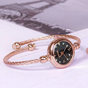 Eight diamond rose gold with black face