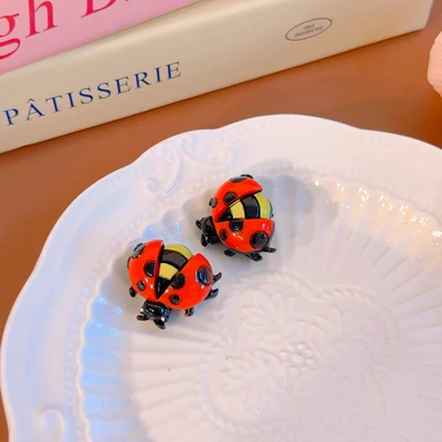 2 colorful ladybugs